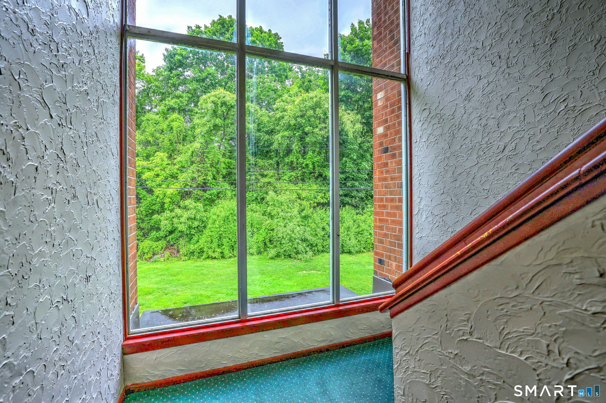 43 Balance Rock Road, Unit 11 Seymour, CT 06483 - Photo 7 of 40 a view of a garden from a window