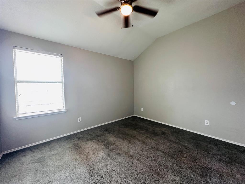 213 Spruce Trail Forney, TX 75126 - Photo 14 of 19 an empty room with a window