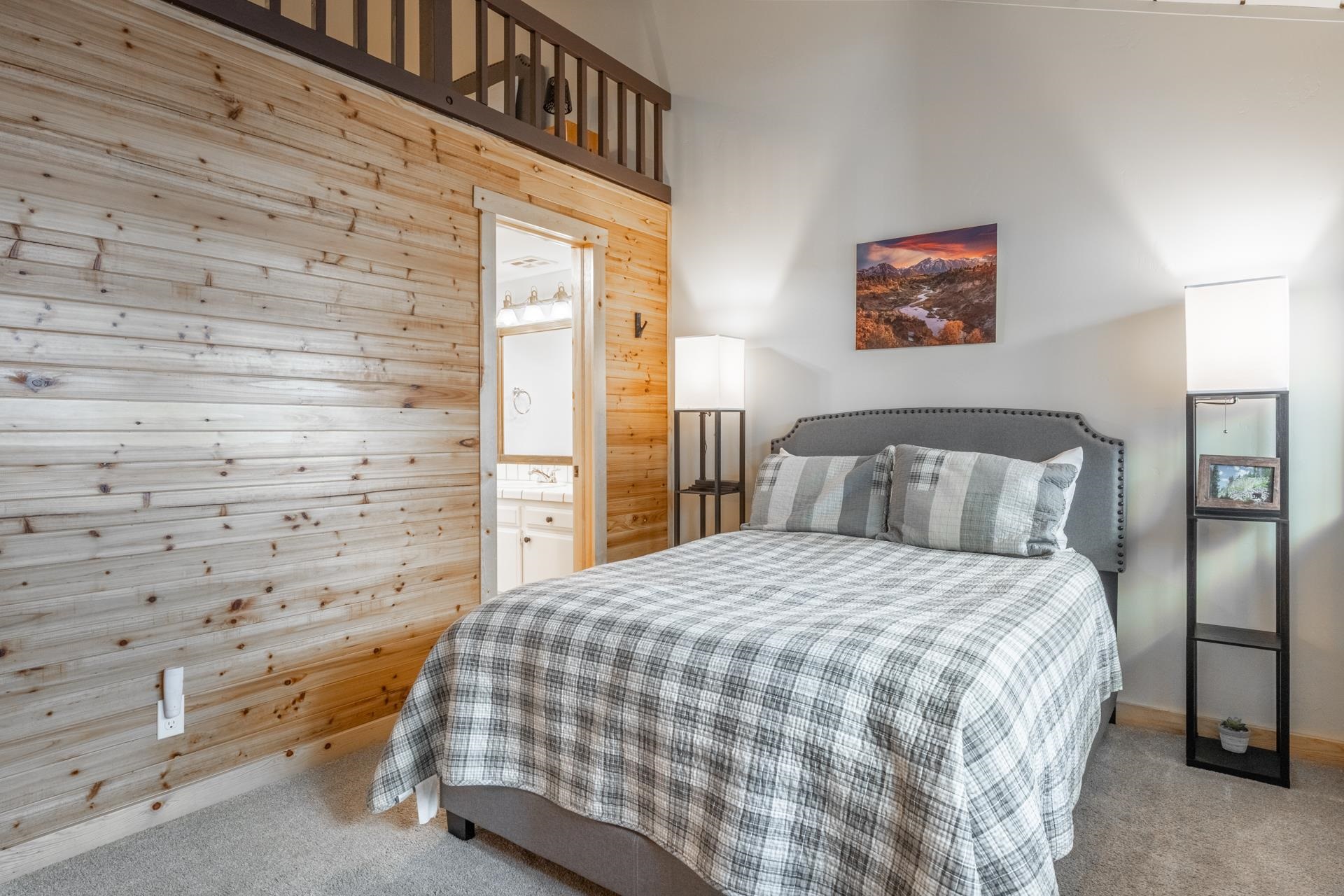 150 Sierra Park Road, Unit 6 Mammoth Lakes, CA 93546 - Photo 20 of 31 Bedroom featuring carpet floors, wooden walls, and ensuite bathroom