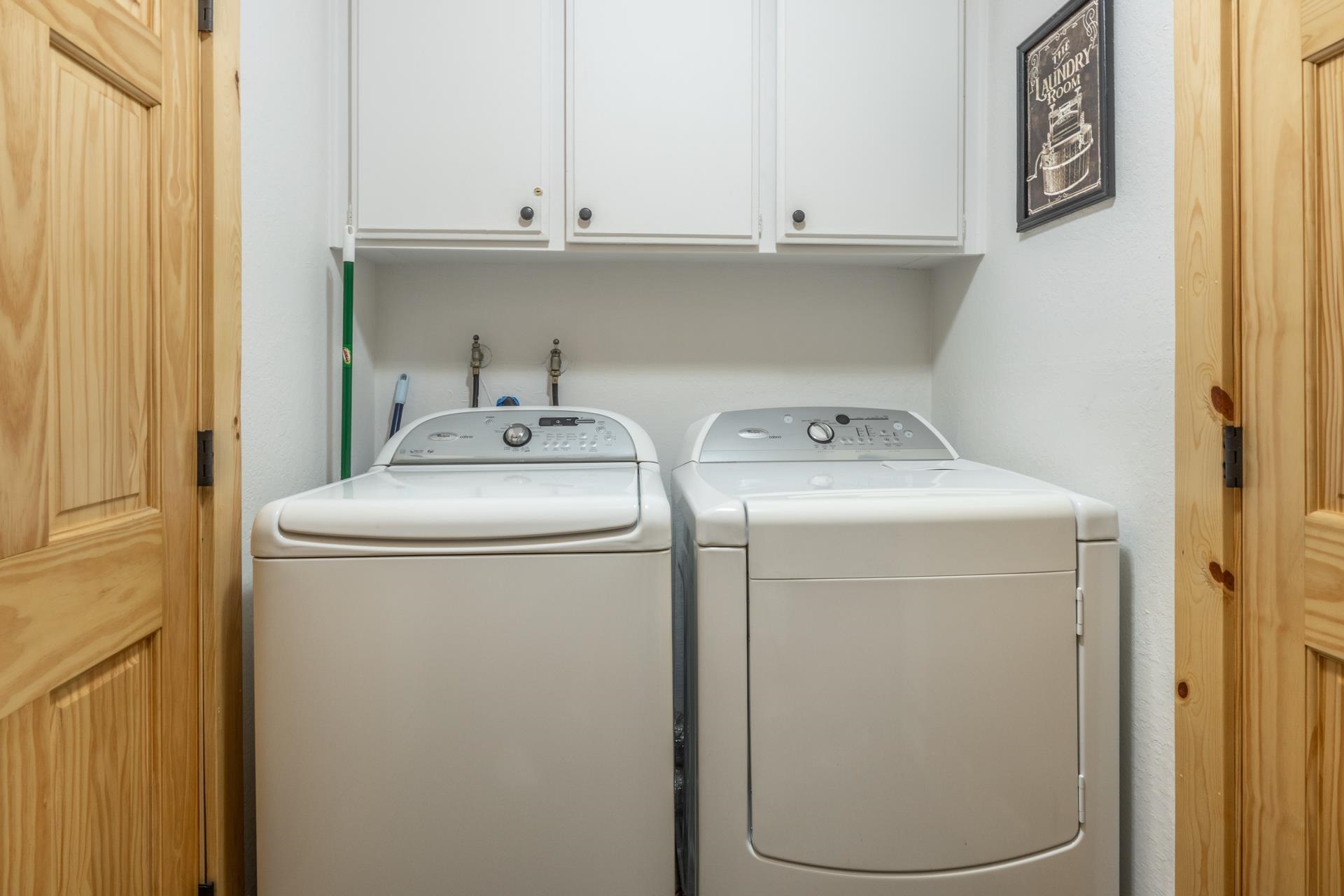 150 Sierra Park Road, Unit 6 Mammoth Lakes, CA 93546 - Photo 10 of 31 Laundry room with washing machine and clothes dryer and cabinet space