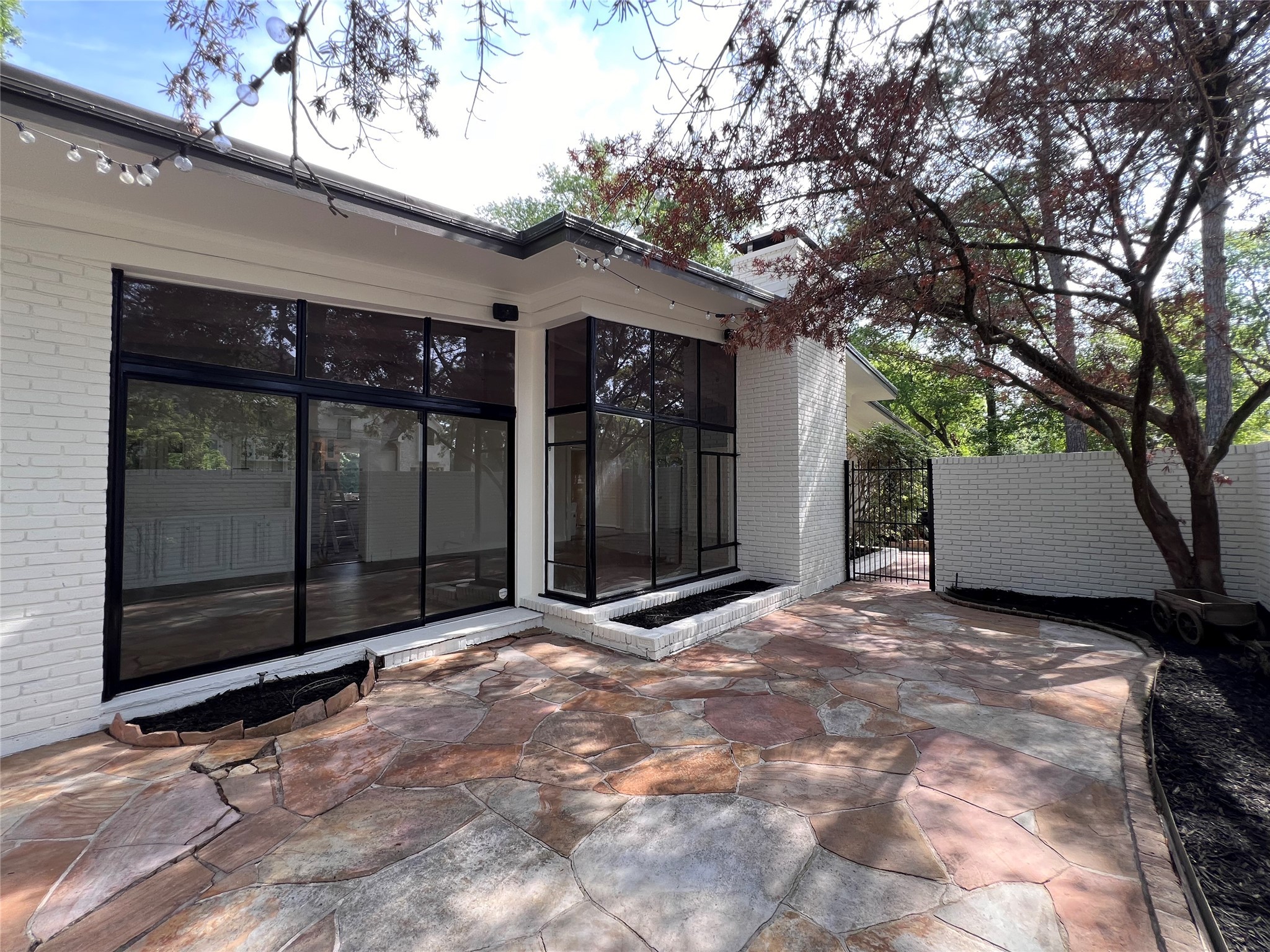 12502 Taylorcrest Road Houston, TX 77024 - Photo 27 of 28 The cozy front courtyard is perfect for your morning coffee or gatherings