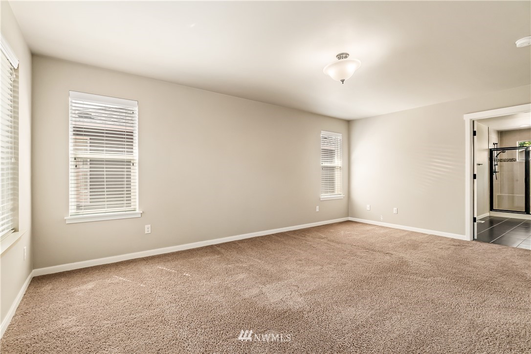 3608 177th Street Southeast Bothell, WA 98012 - Photo 22 of 32 an empty room with windows