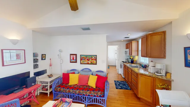 a living room with furniture and rug