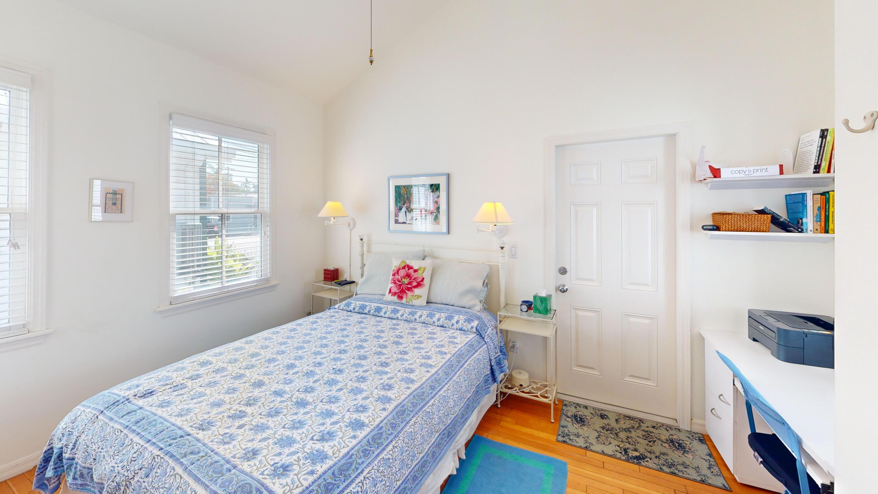 308 Margaret Street, Unit 2 Key West, FL 33040 - Photo 4 of 7 a bedroom with a bed and a dresser in it
