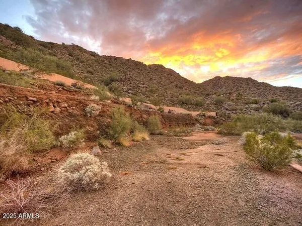 a view of mountains and valleys
