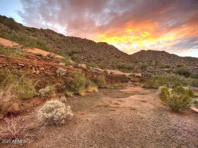 a view of mountains and valleys