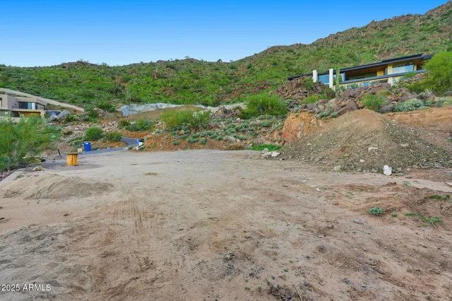 a view of a road with an ocean view