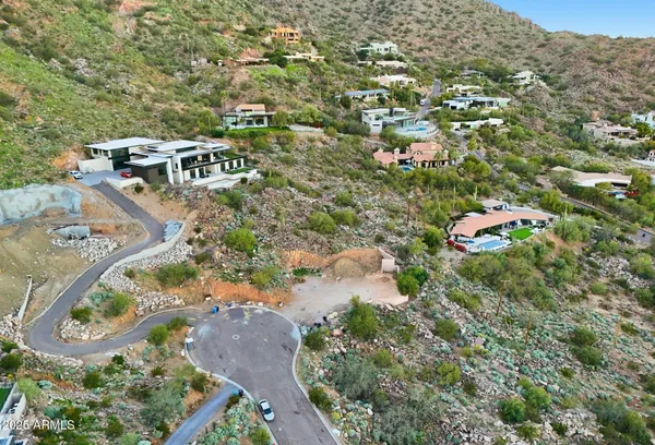 an aerial view of a city with lots of residential buildings