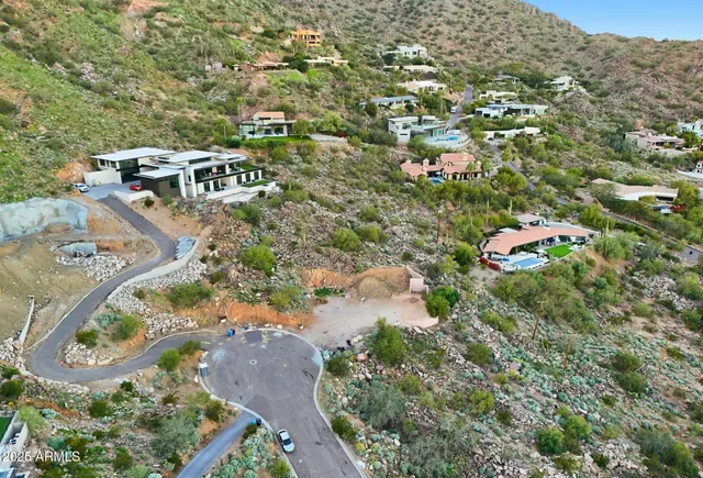 an aerial view of a city with lots of residential buildings