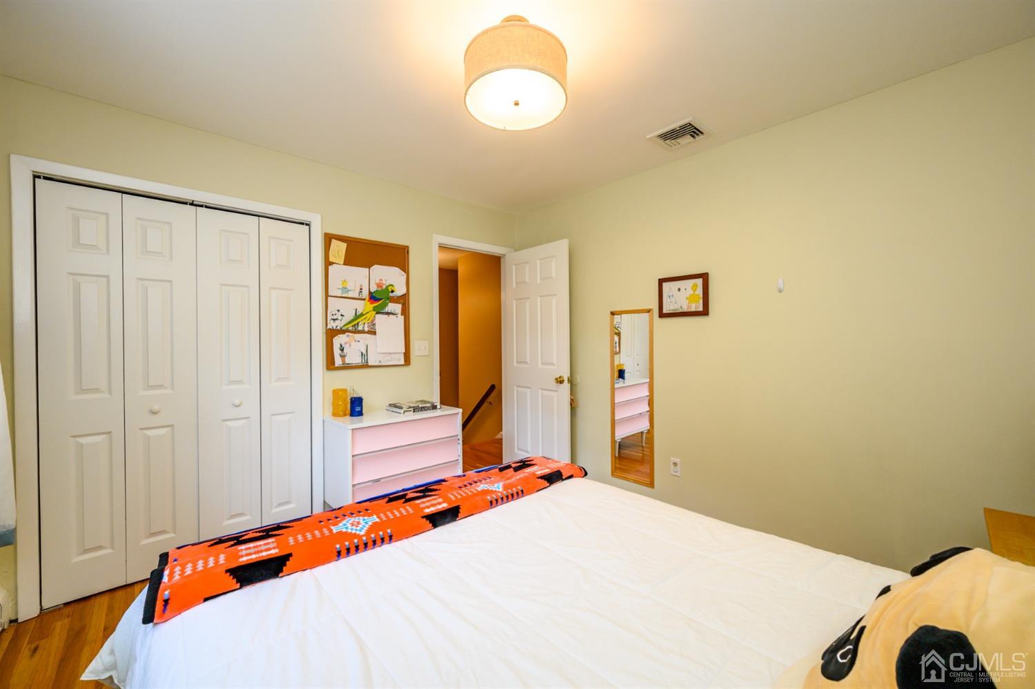 24 Clover Lane Randolph, NJ 07869 - Photo 31 of 59 a bedroom with a bed and a window