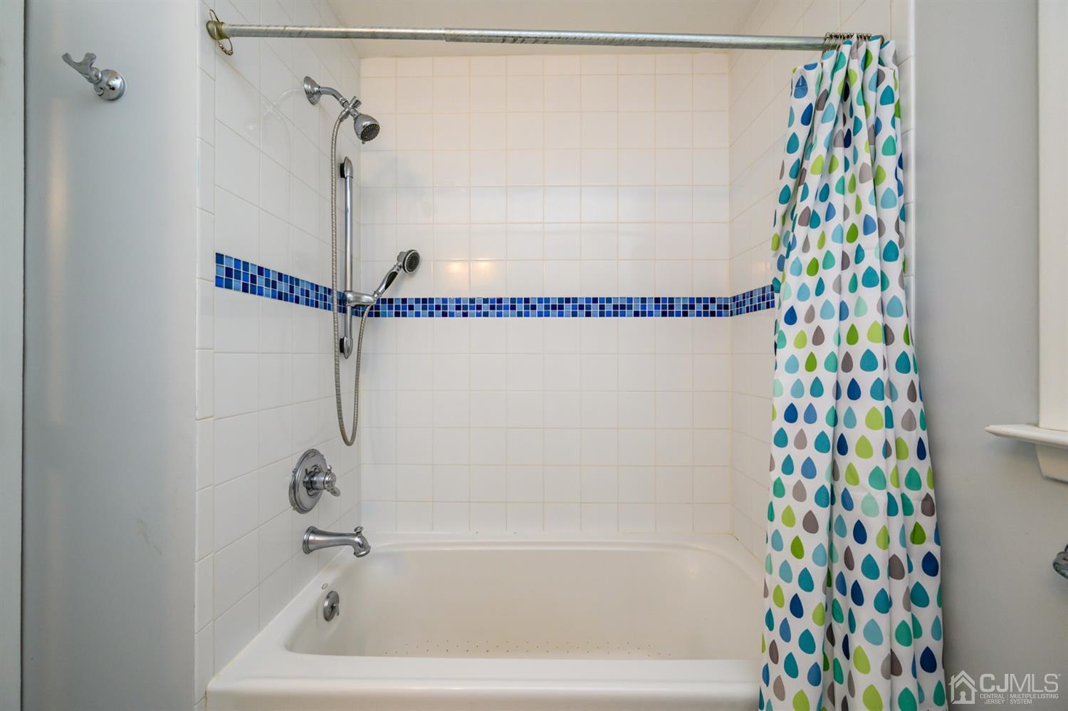 24 Clover Lane Randolph, NJ 07869 - Photo 39 of 59 a bathroom with a bathtub and shower