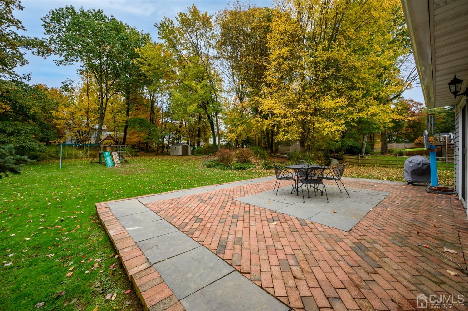 24 Clover Lane Randolph, NJ 07869 - Photo 45 of 59 a view of a backyard with sitting area