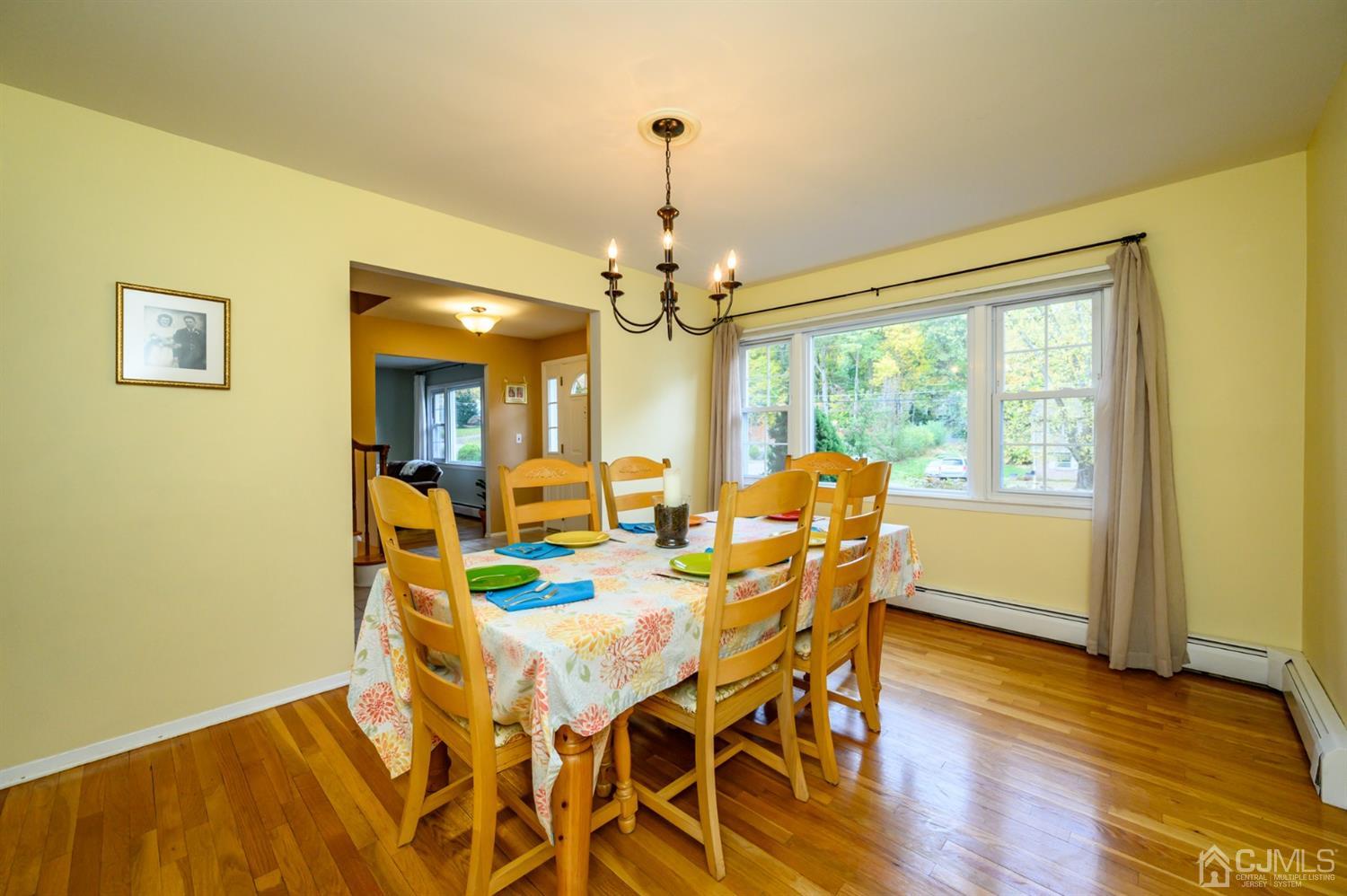 24 Clover Lane Randolph, NJ 07869 - Photo 6 of 59 a view of a dining room with furniture window and wooden floor