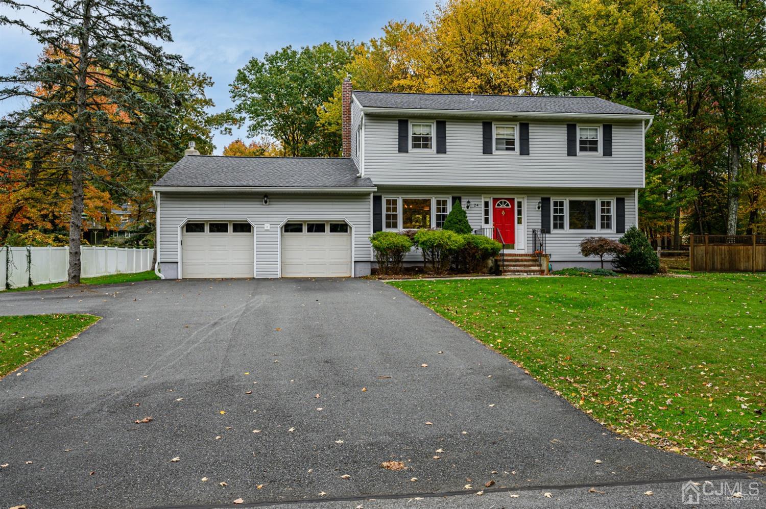 24 Clover Lane Randolph, NJ 07869 - Photo 58 of 59 a front view of a house with garden