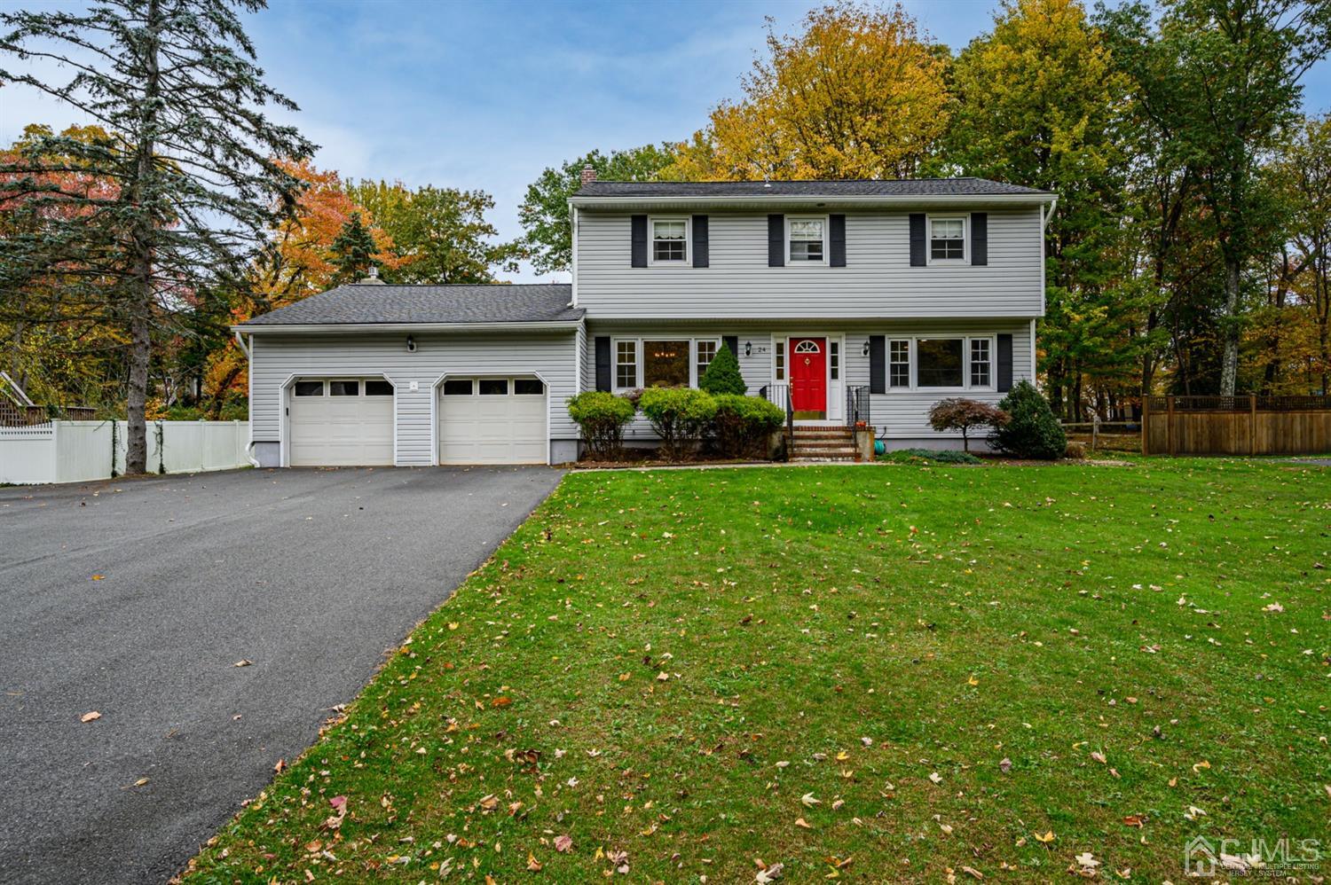 24 Clover Lane Randolph, NJ 07869 - Photo 59 of 59 a view of a big house with a big yard and large trees