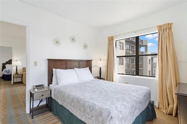 a bathroom with a sink mirror and vanity
