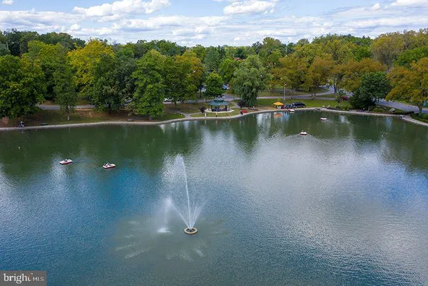 an aerial view of a house with a lake view