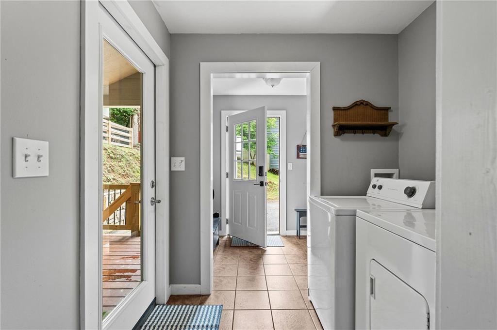 221 Reece Creek Road West Blairsville, GA 30512 - Photo 11 of 42 a room with a baby crib and a window