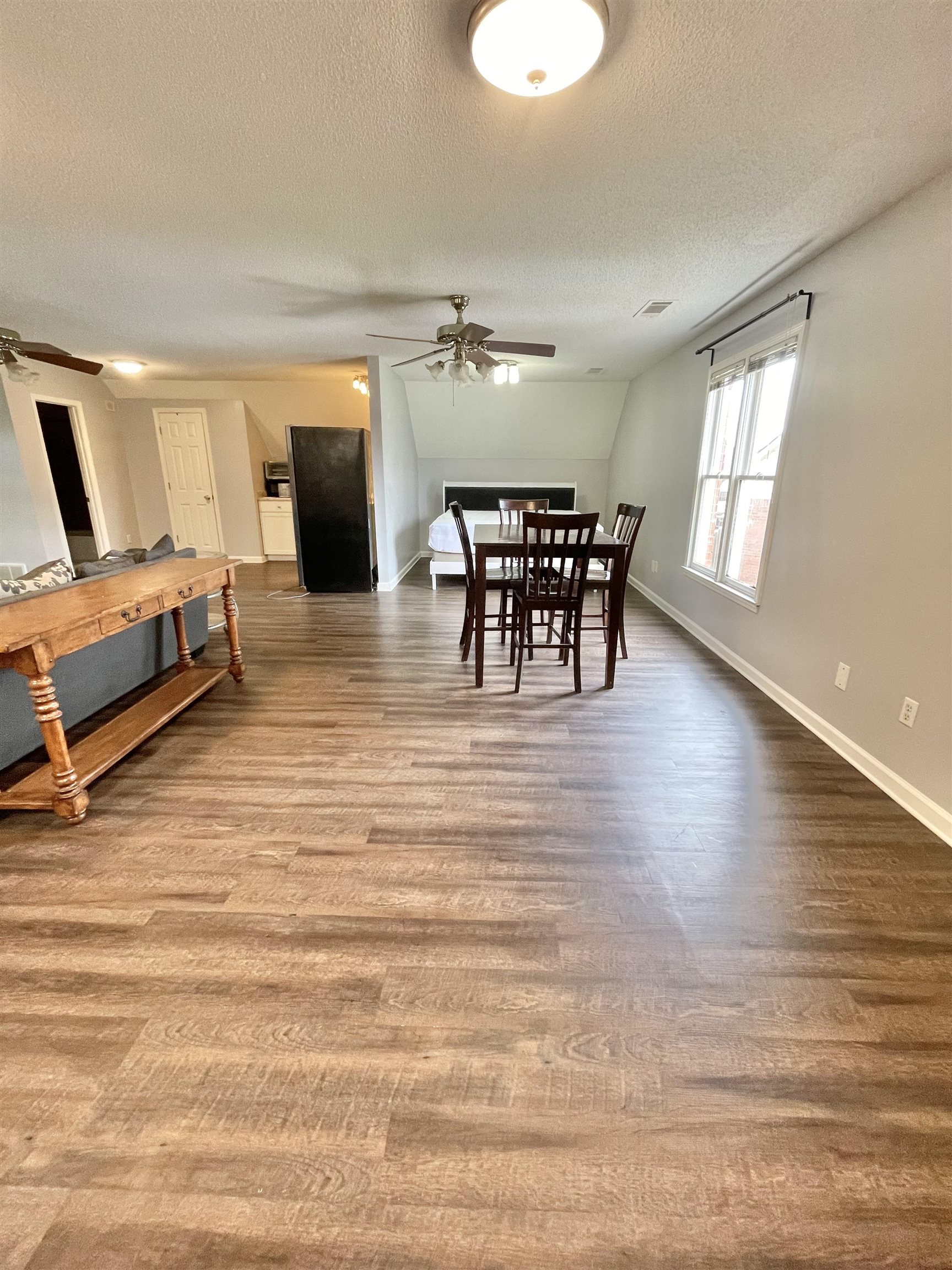 3446 Peter Cove Bartlett, TN 38133 - Photo 3 of 6 a living room with furniture and a wooden floor