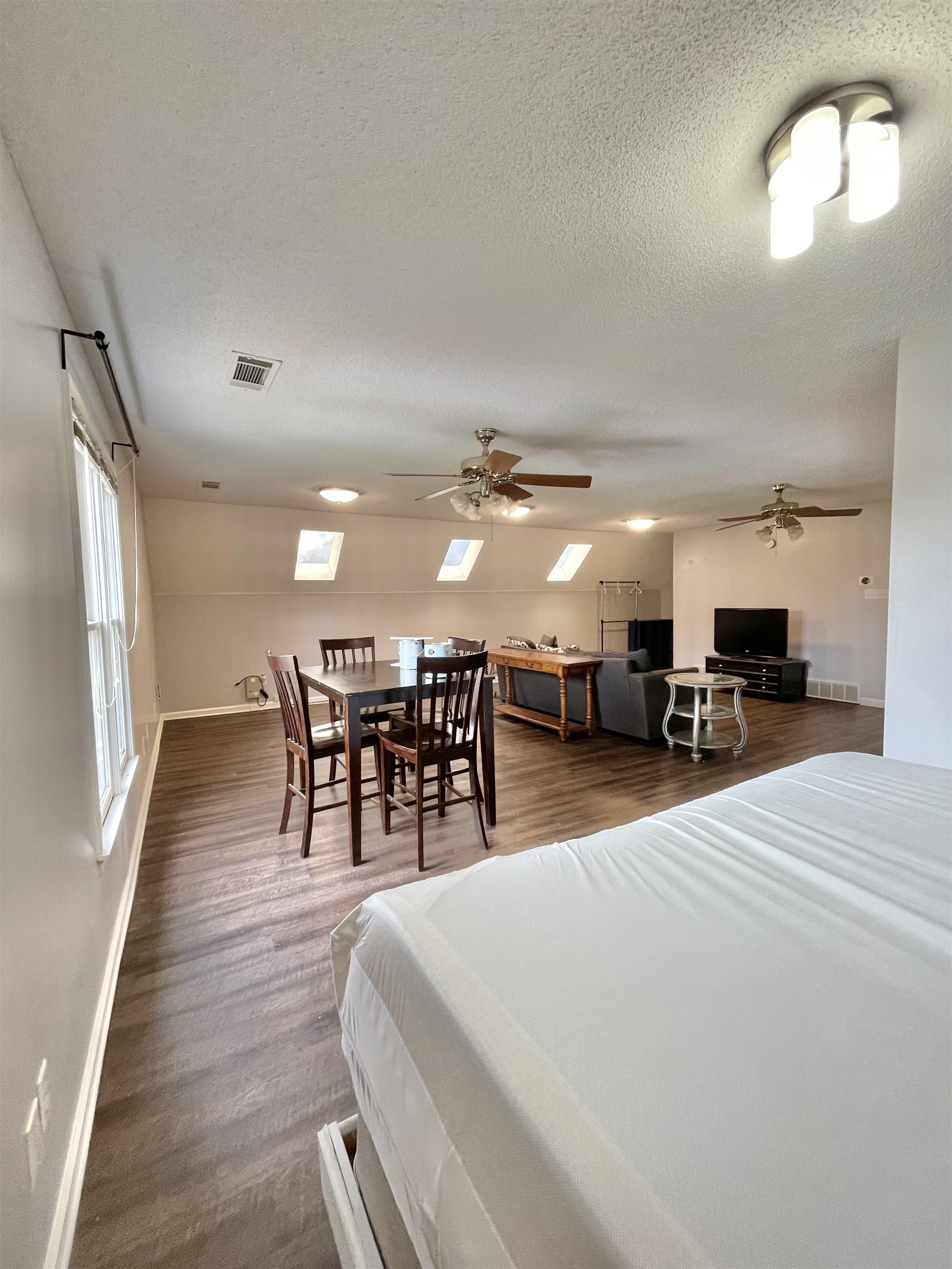 3446 Peter Cove Bartlett, TN 38133 - Photo 5 of 6 a room with lots of furniture and a chandelier