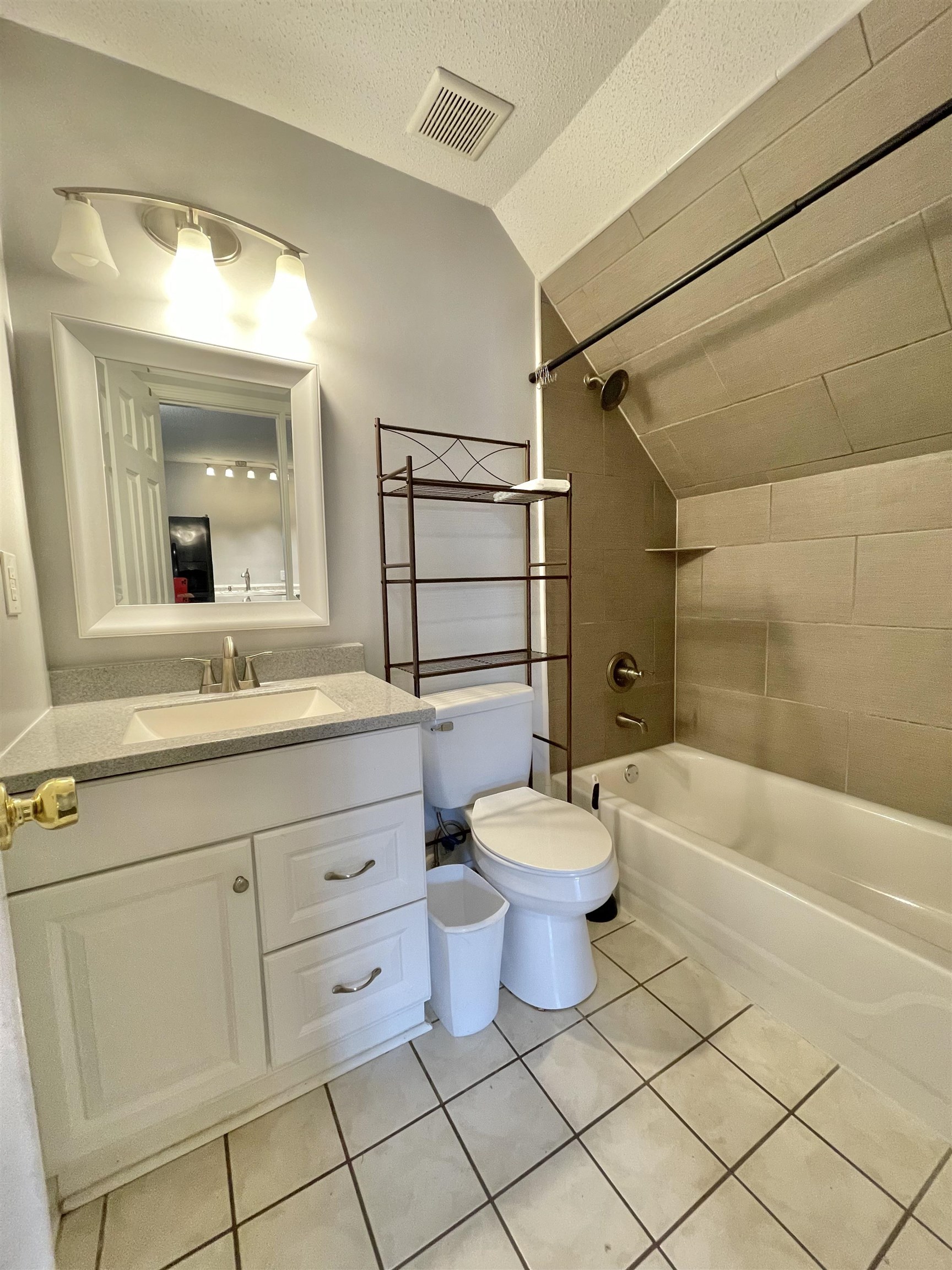 3446 Peter Cove Bartlett, TN 38133 - Photo 6 of 6 a bathroom with a sink a toilet and shower