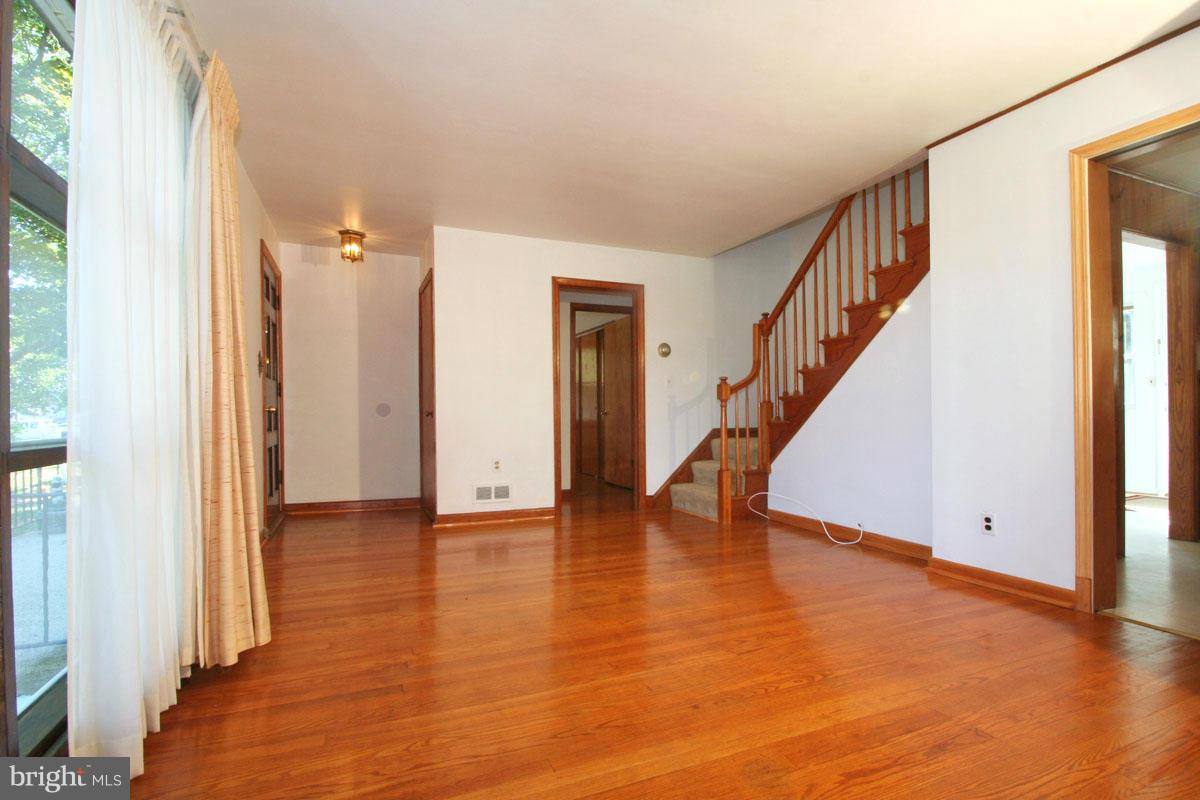 1604 Lynch Road Dundalk, MD 21222 - Photo 2 of 30 a view of an entryway with wooden floor