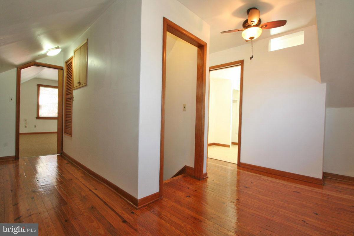 1604 Lynch Road Dundalk, MD 21222 - Photo 15 of 30 a view of a hallway with wooden floor