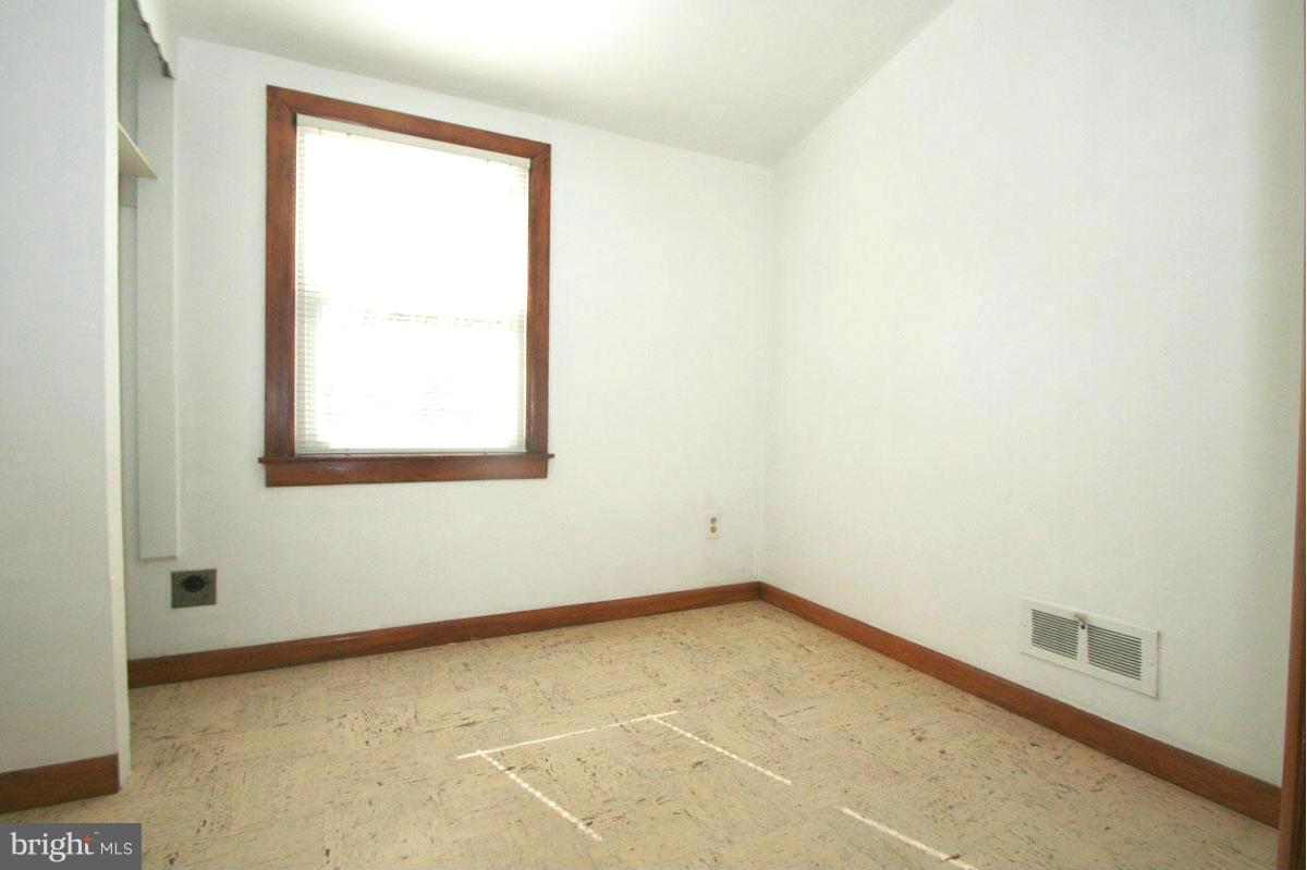 1604 Lynch Road Dundalk, MD 21222 - Photo 16 of 30 an empty room with a window