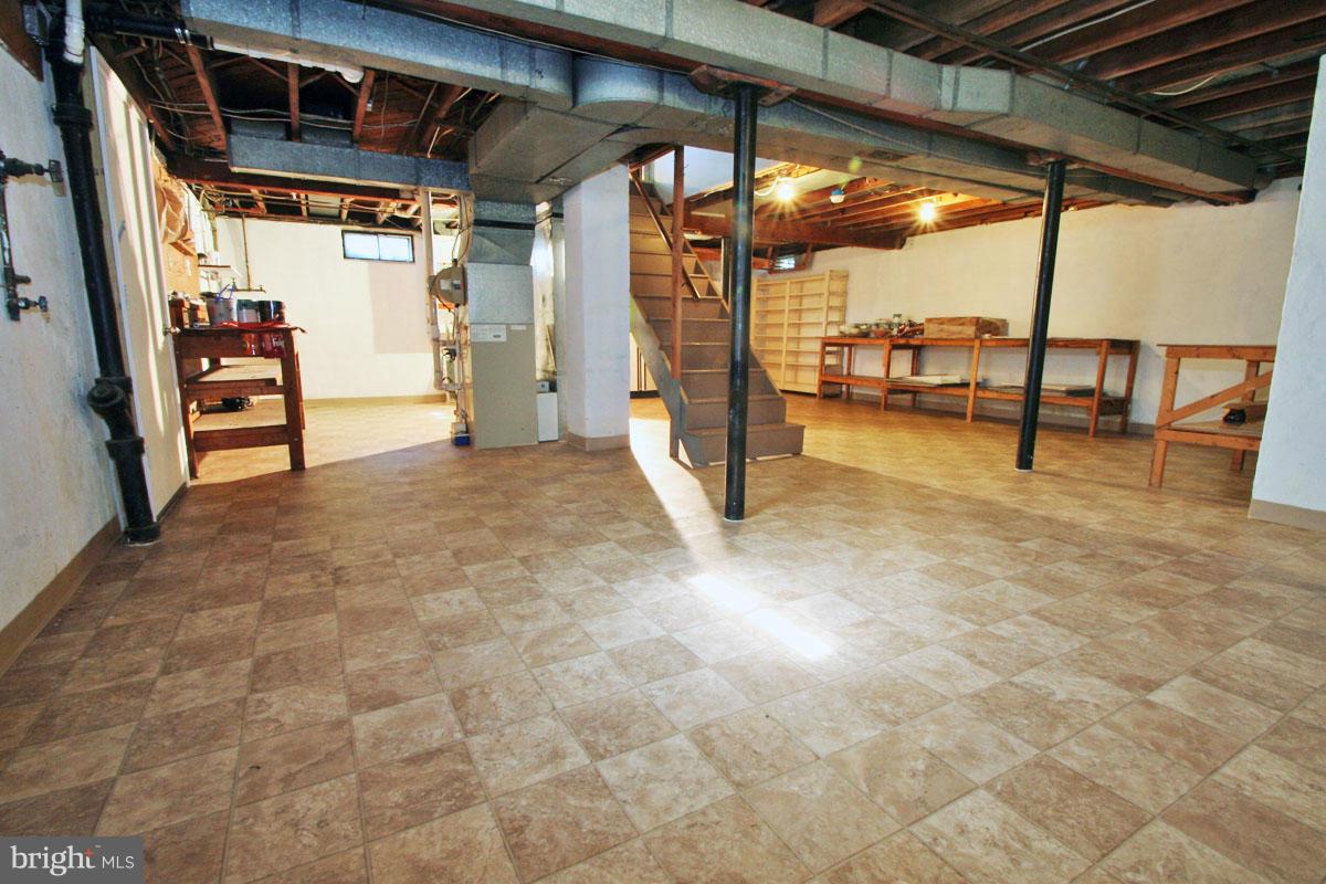 1604 Lynch Road Dundalk, MD 21222 - Photo 19 of 30 a view of an empty room with wooden floor