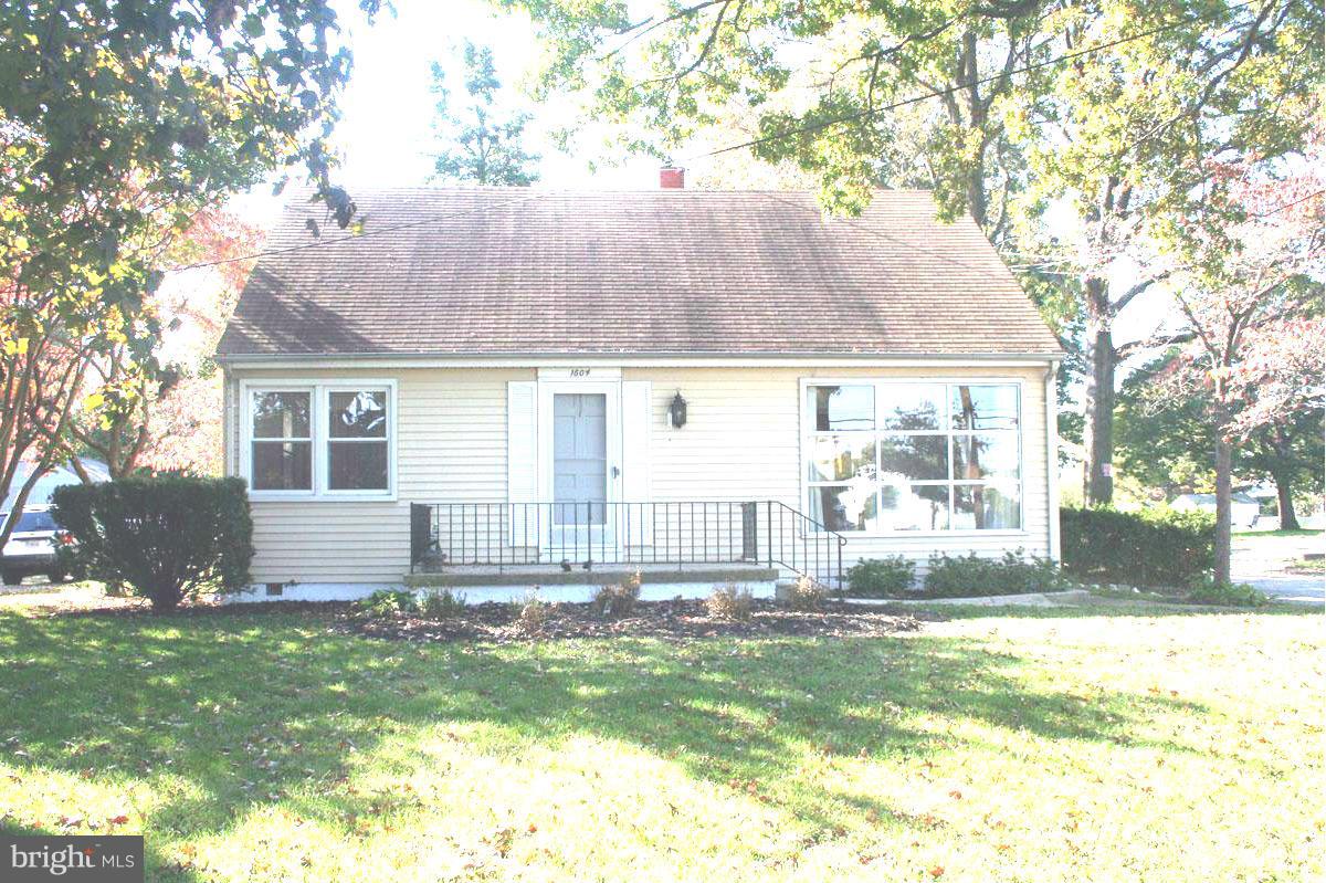 1604 Lynch Road Dundalk, MD 21222 - Photo 21 of 30 a front view of a house with a yard