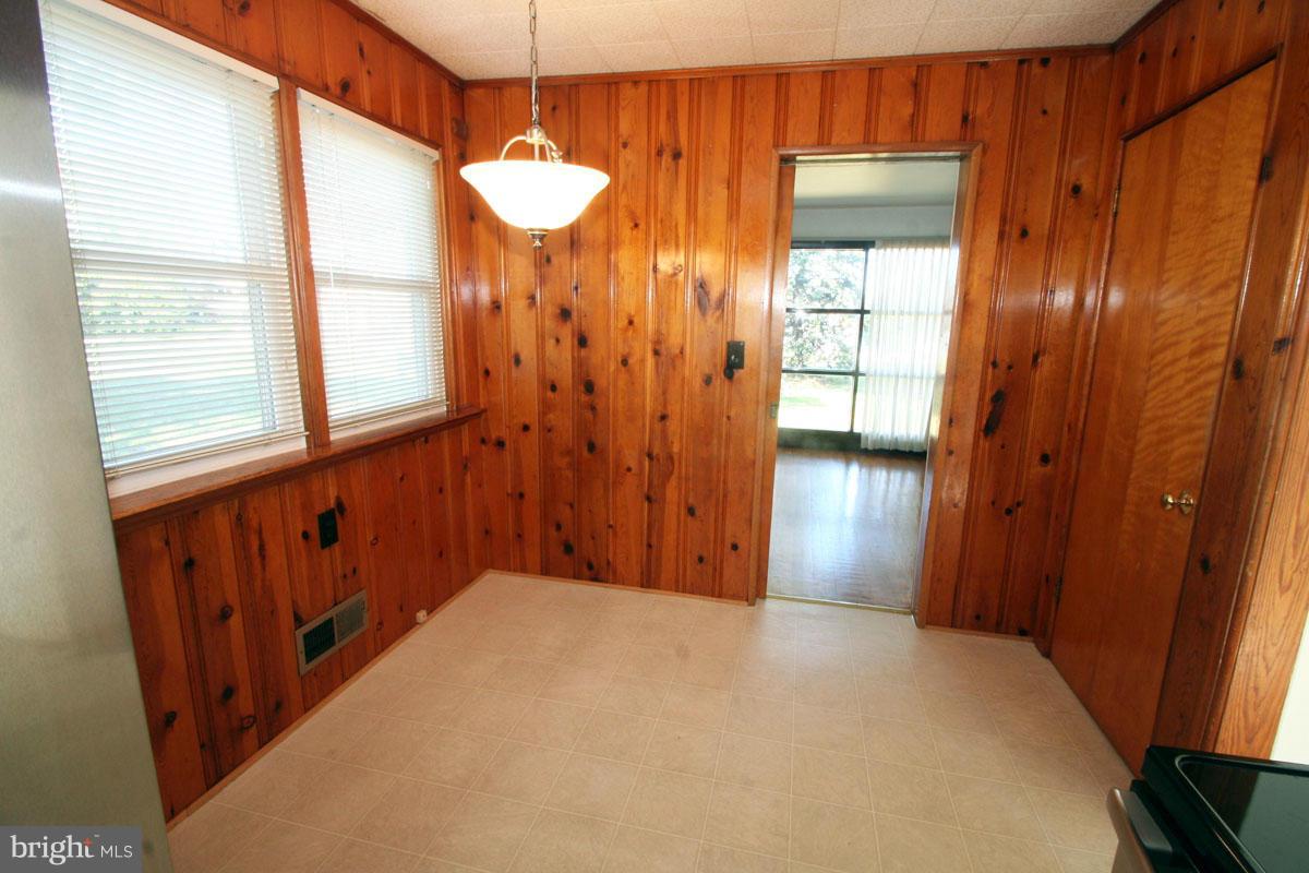 1604 Lynch Road Dundalk, MD 21222 - Photo 7 of 30 a view of a hallway with windows