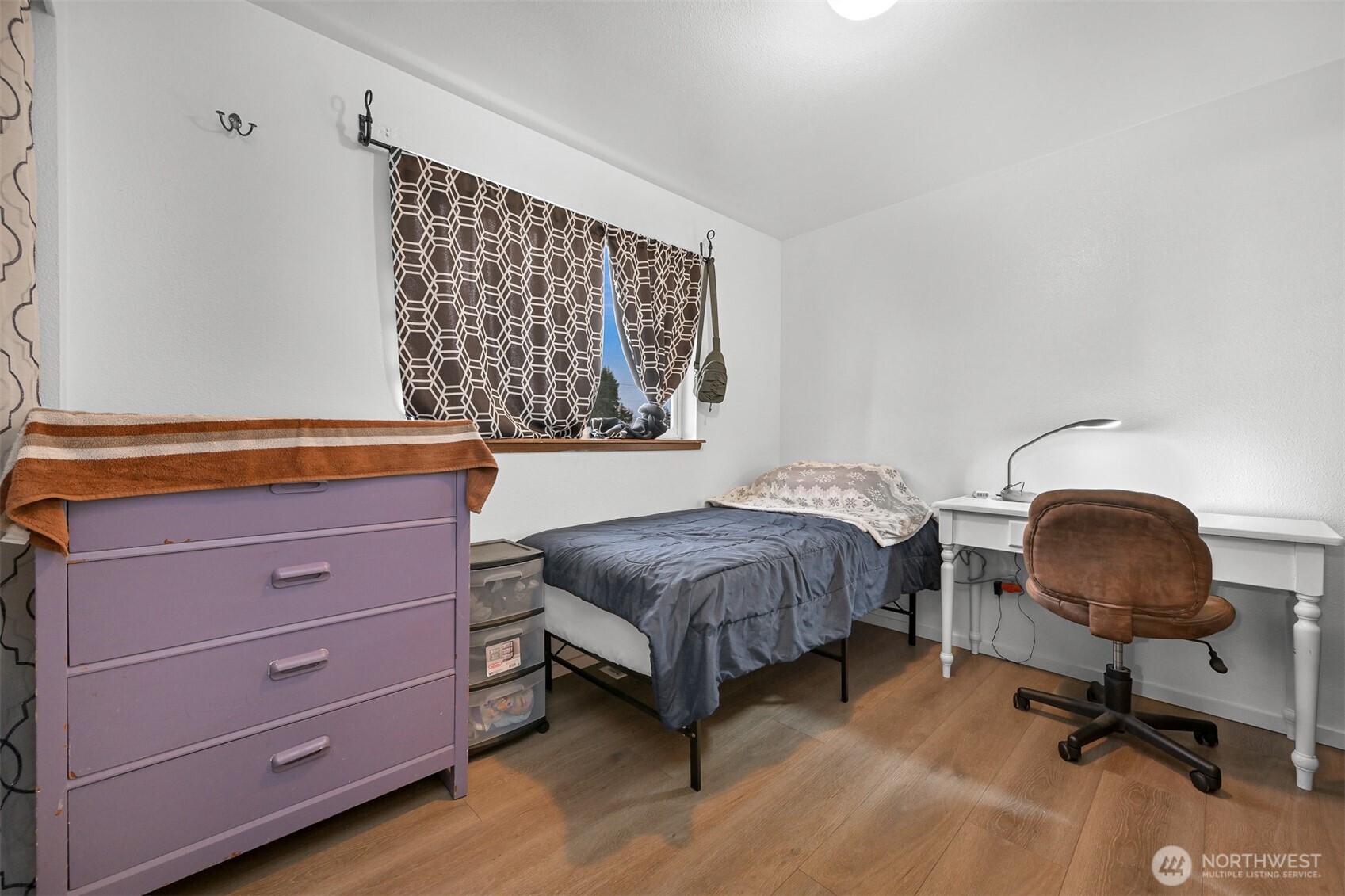 5315 Shields Road Ferndale, WA 98248 - Photo 22 of 36 a bedroom with a bed and chair