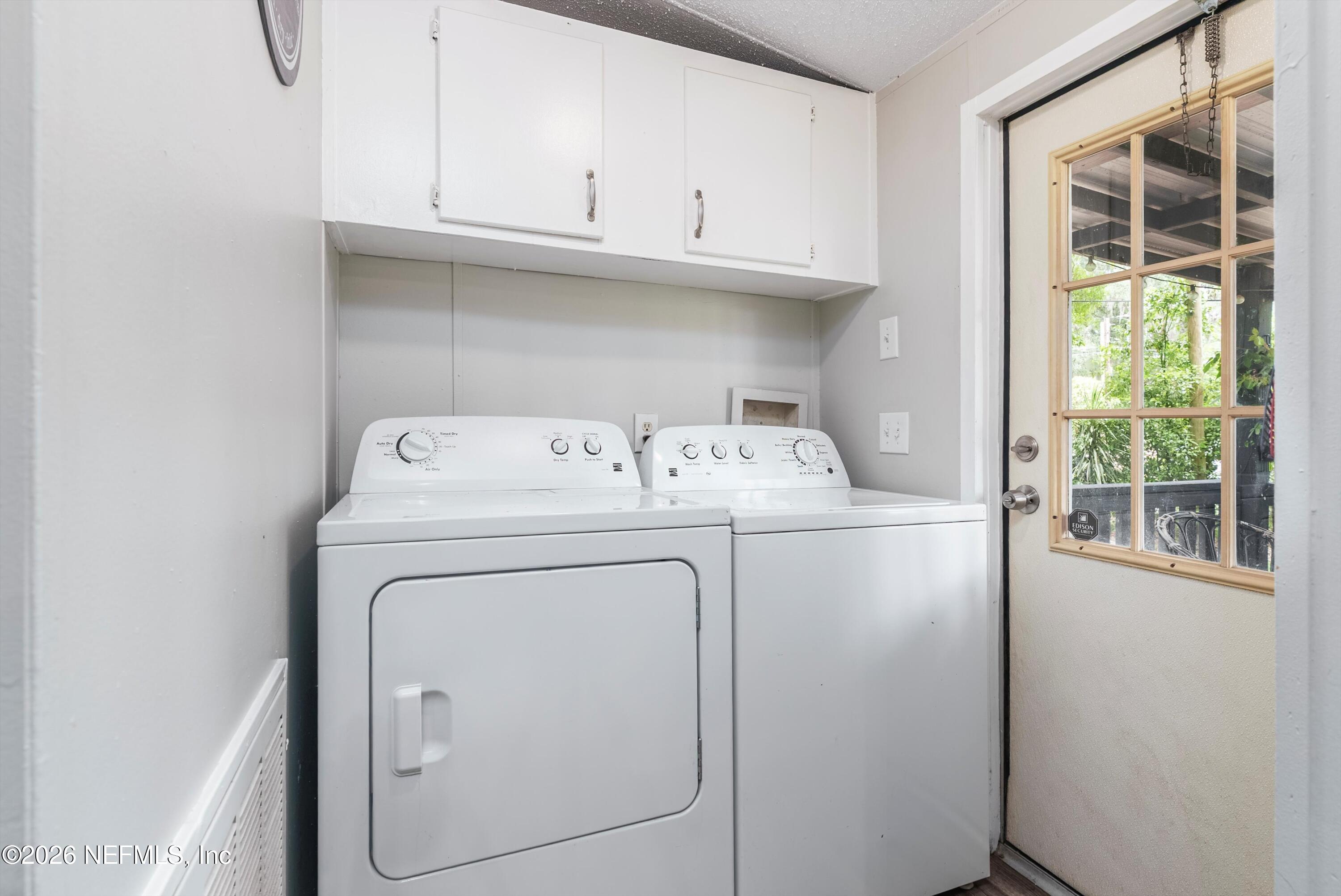 85246 Johnson Lane Yulee, FL 32097 - Photo 27 of 46 a utility room with dryer and washer