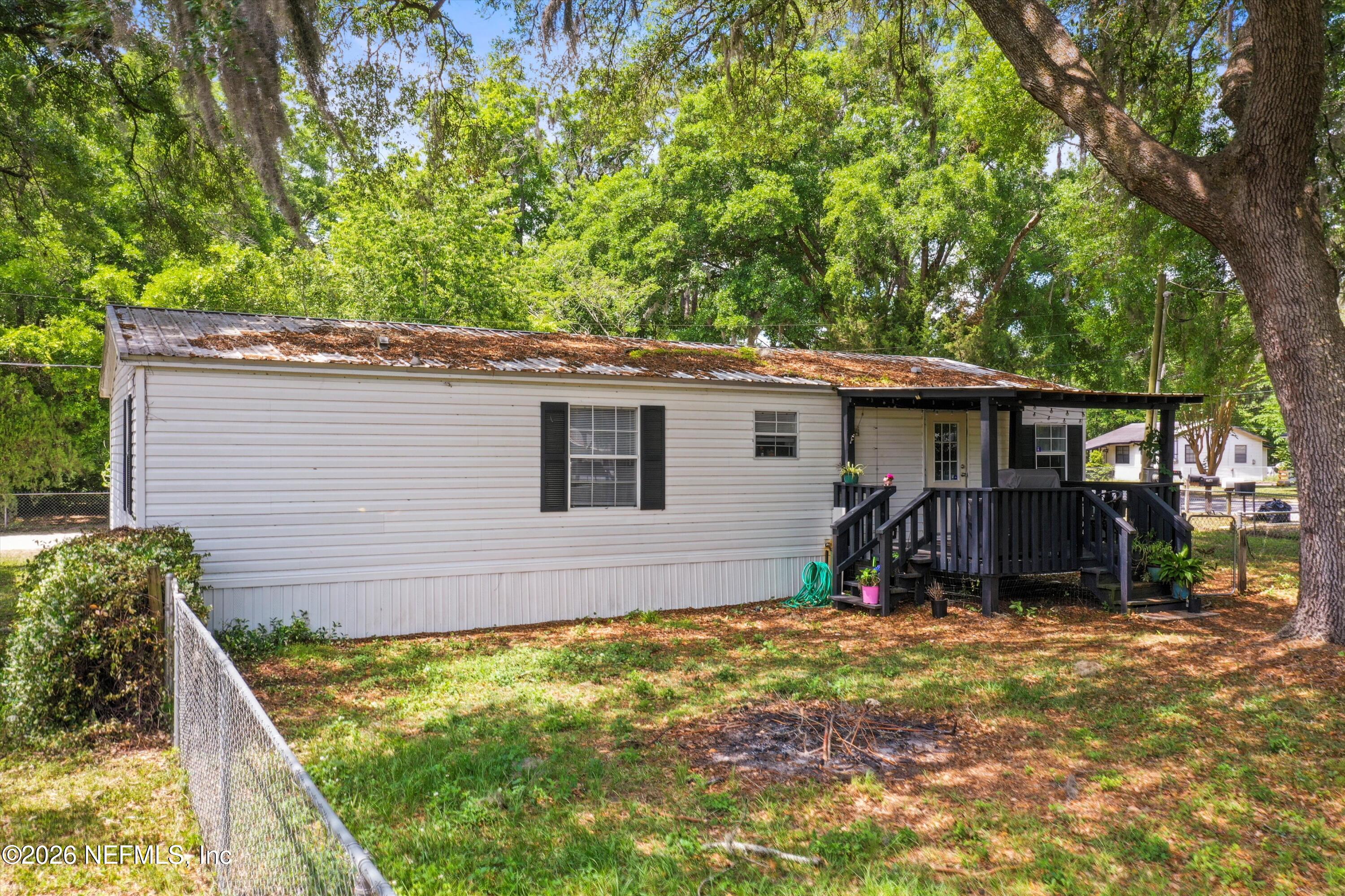 85246 Johnson Lane Yulee, FL 32097 - Photo 30 of 46 a view of house with backyard