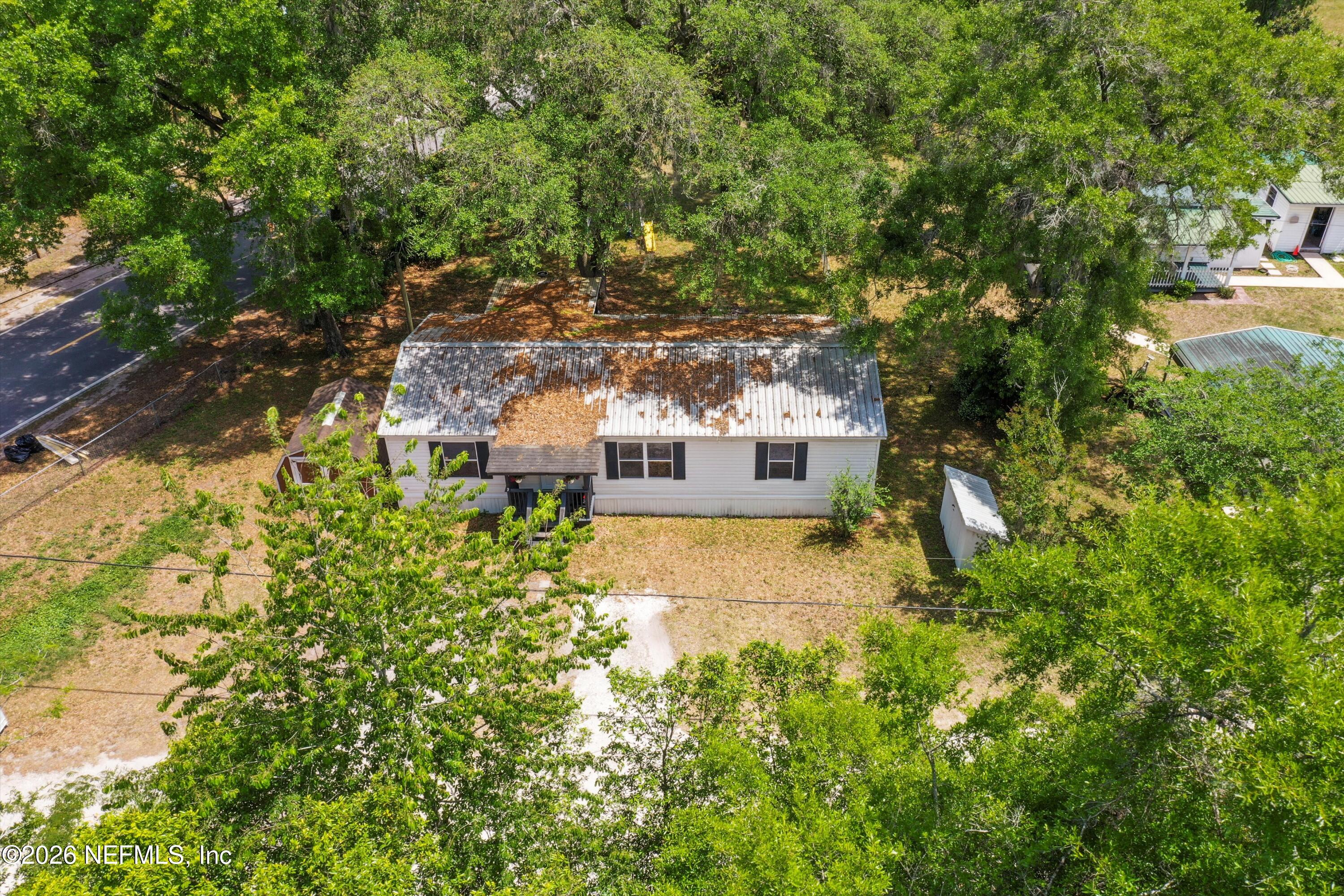 85246 Johnson Lane Yulee, FL 32097 - Photo 3 of 46 a balcony with a yard