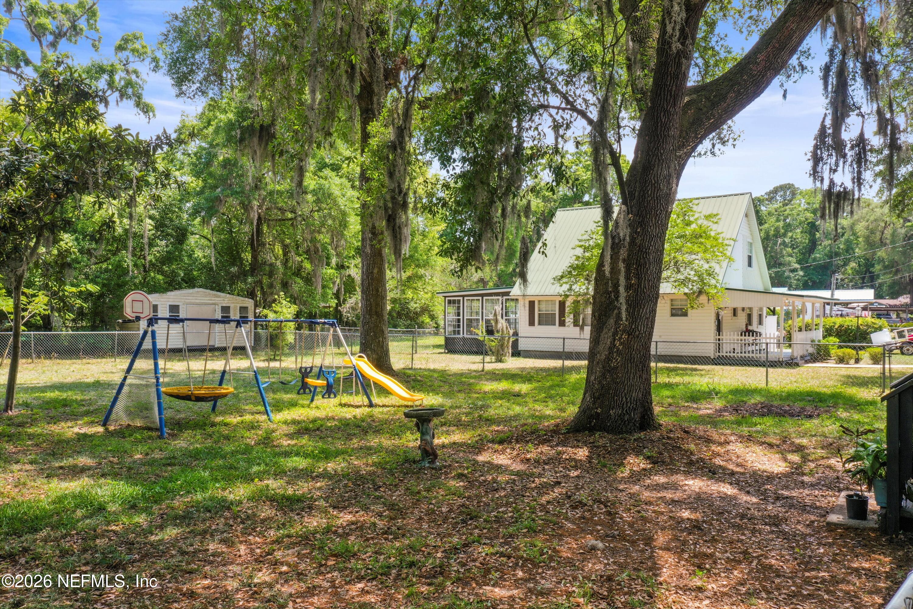 85246 Johnson Lane Yulee, FL 32097 - Photo 32 of 46 a view of a park with a slide
