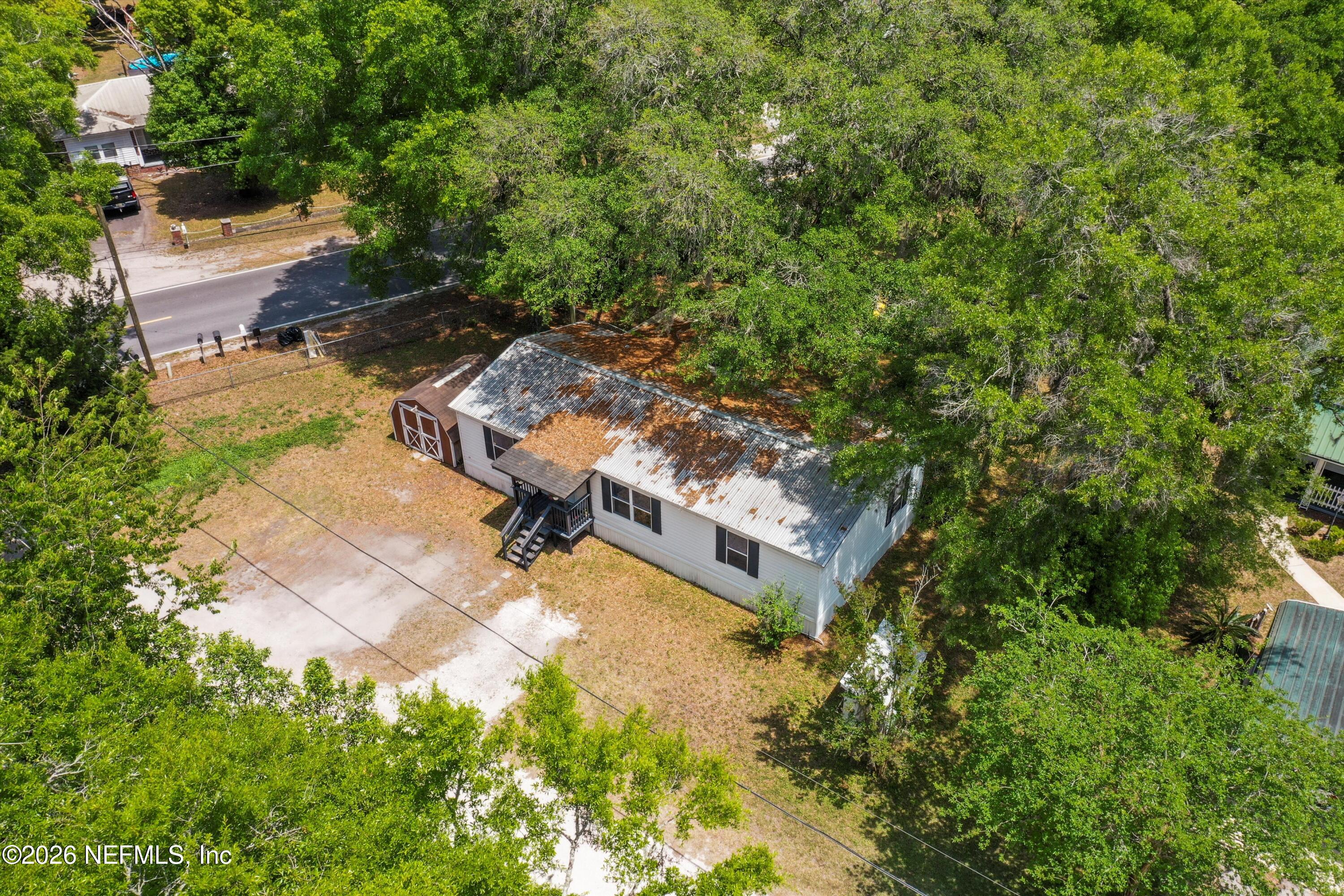 85246 Johnson Lane Yulee, FL 32097 - Photo 4 of 46 an aerial view of residential house with outdoor space