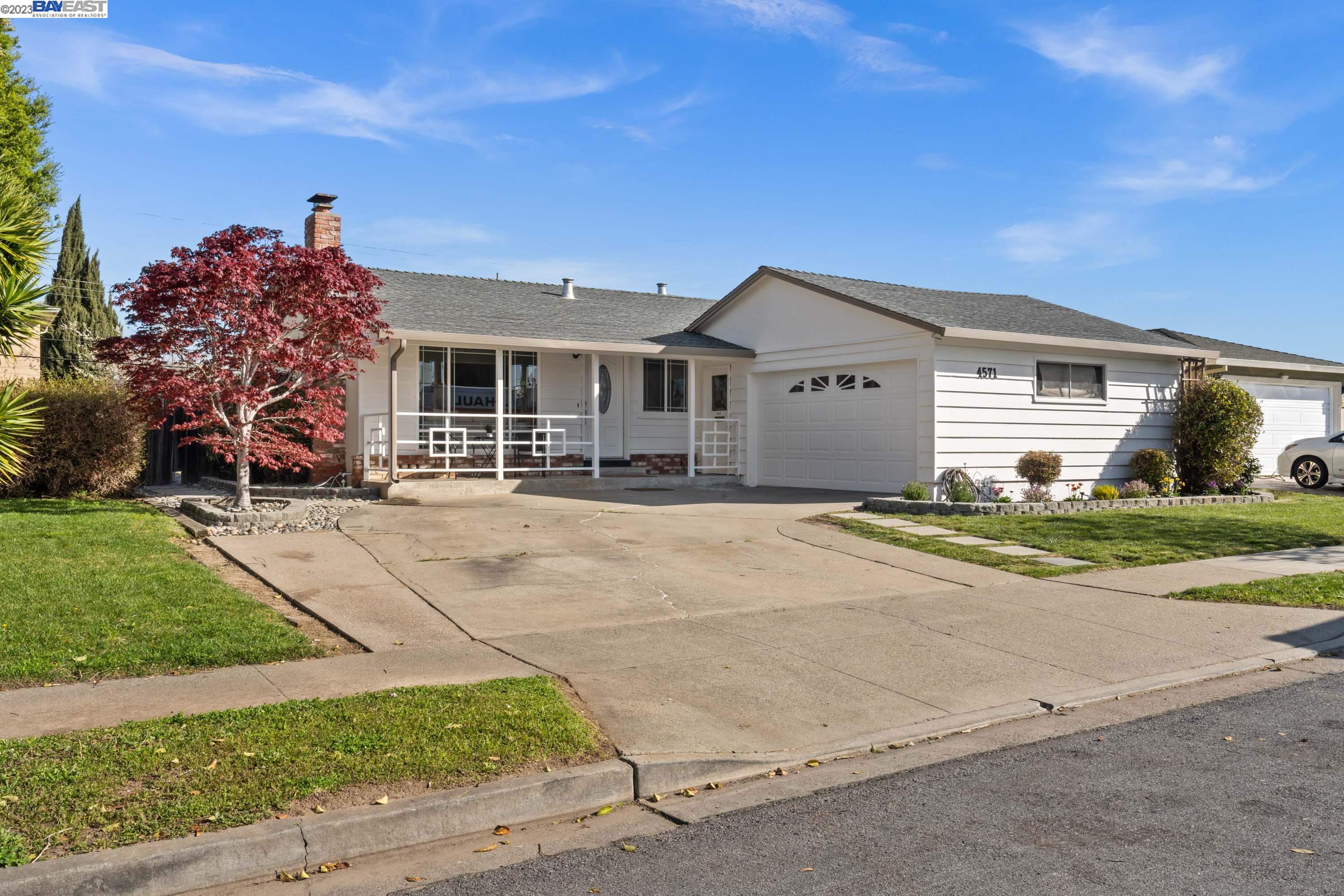 front view of house with a yard