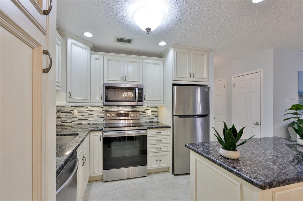 8911 Blind Pass Road, Unit 306 St. Pete Beach, FL 33706 - Photo 11 of 48
