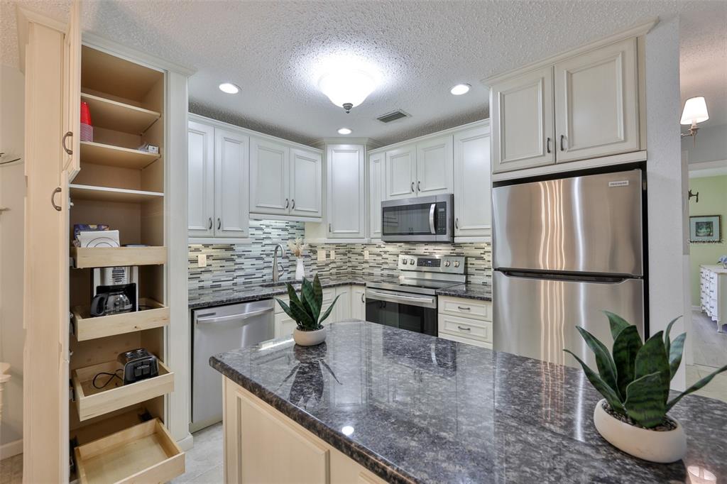 8911 Blind Pass Road, Unit 306 St. Pete Beach, FL 33706 - Photo 13 of 48