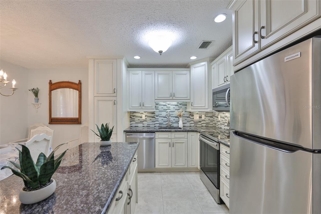 8911 Blind Pass Road, Unit 306 St. Pete Beach, FL 33706 - Photo 14 of 48