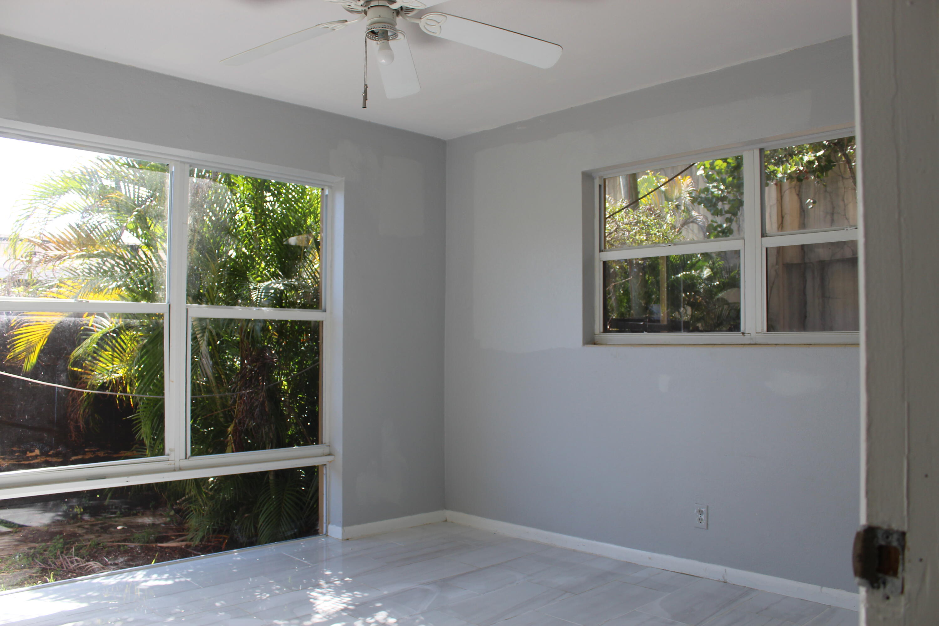 921 Pine Terrace Lake Worth Beach, FL 33460 - Photo 7 of 10 a view of a room with a large window