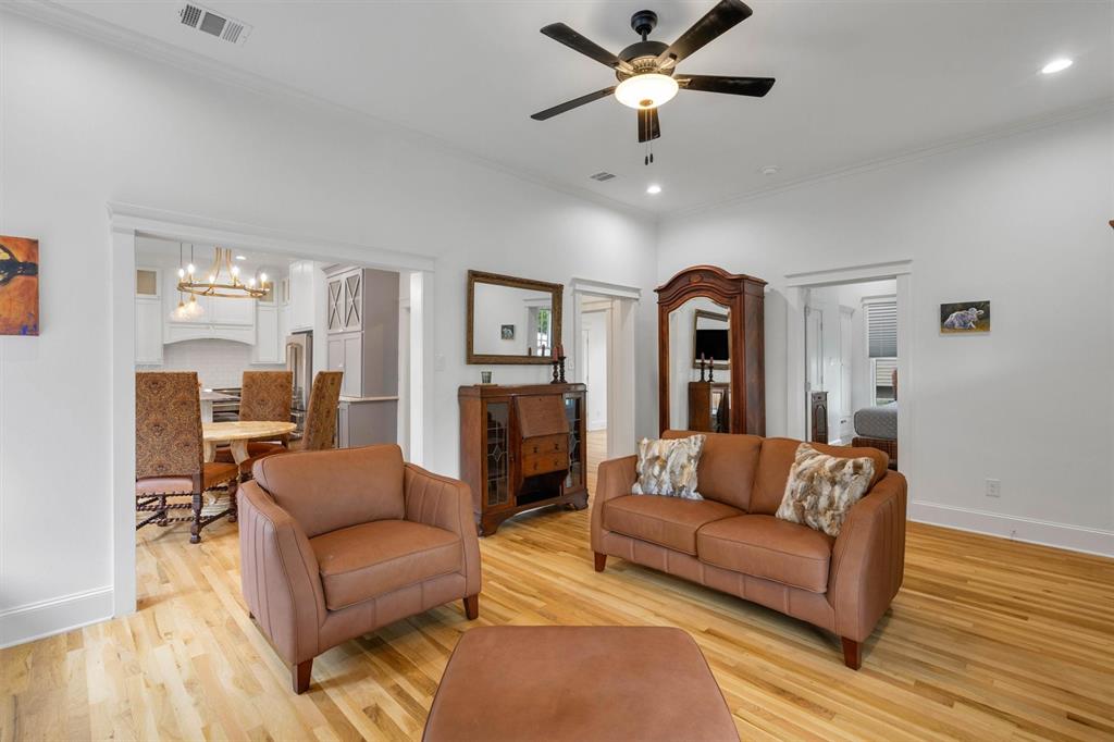 5727 Victor Street Dallas, TX 75214 - Photo 11 of 40 a living room with furniture and a ceiling fan