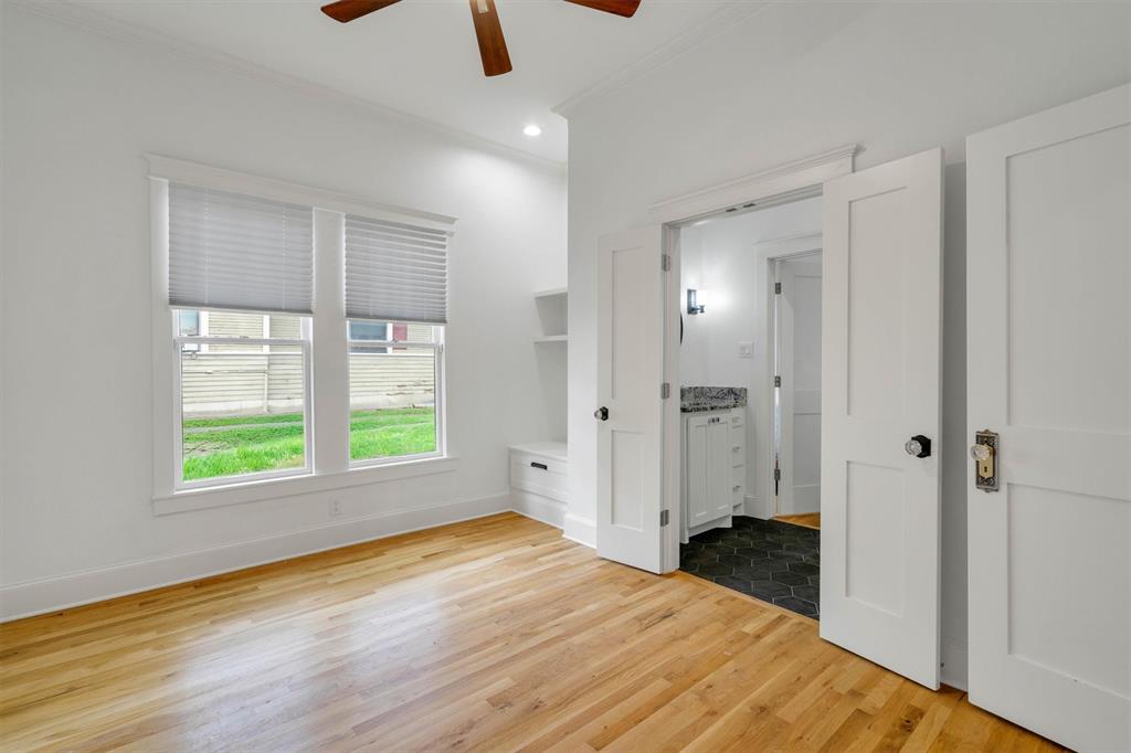 5727 Victor Street Dallas, TX 75214 - Photo 26 of 40 a view of a livingroom with a hardwood and a window