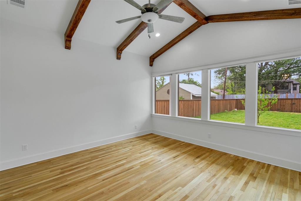 5727 Victor Street Dallas, TX 75214 - Photo 31 of 40 a view of an empty room with a window