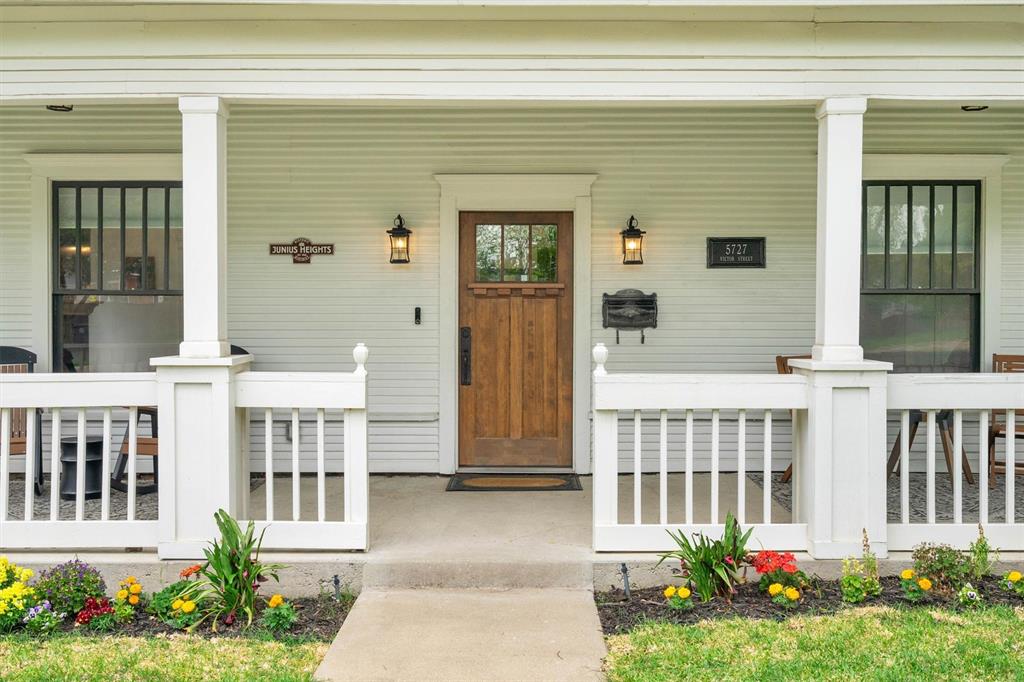 5727 Victor Street Dallas, TX 75214 - Photo 7 of 40 a front view of a house with a garden