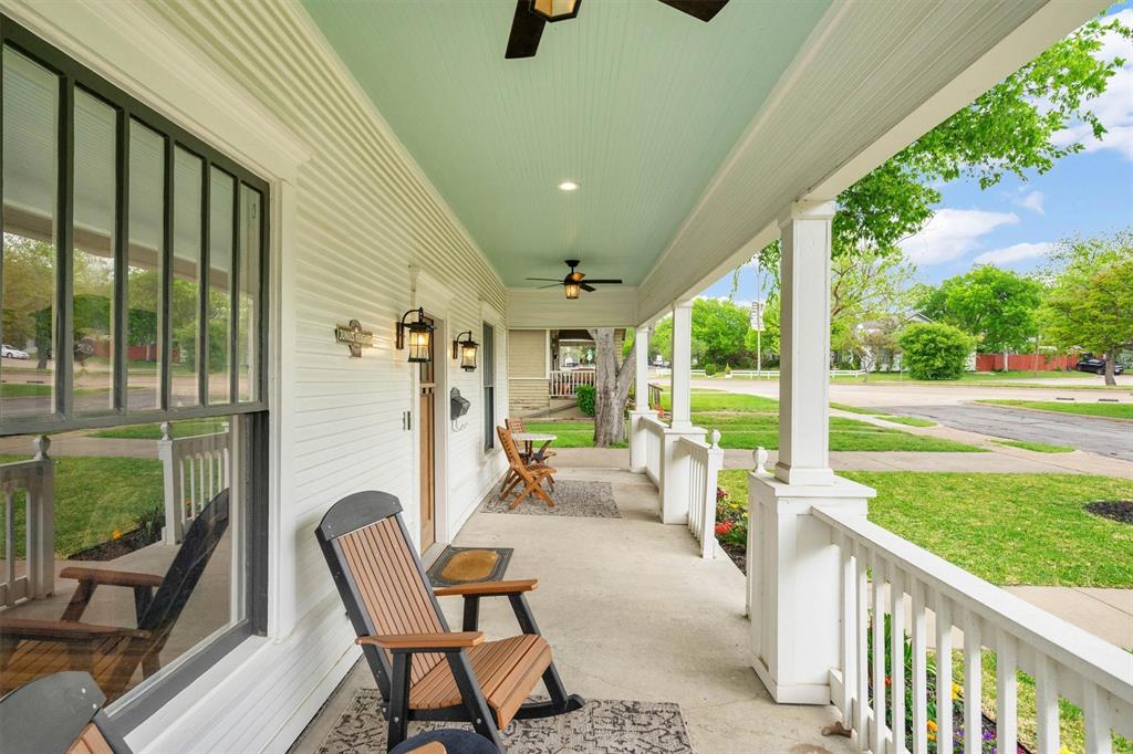 5727 Victor Street Dallas, TX 75214 - Photo 8 of 40 a view of a porch with furniture and garden