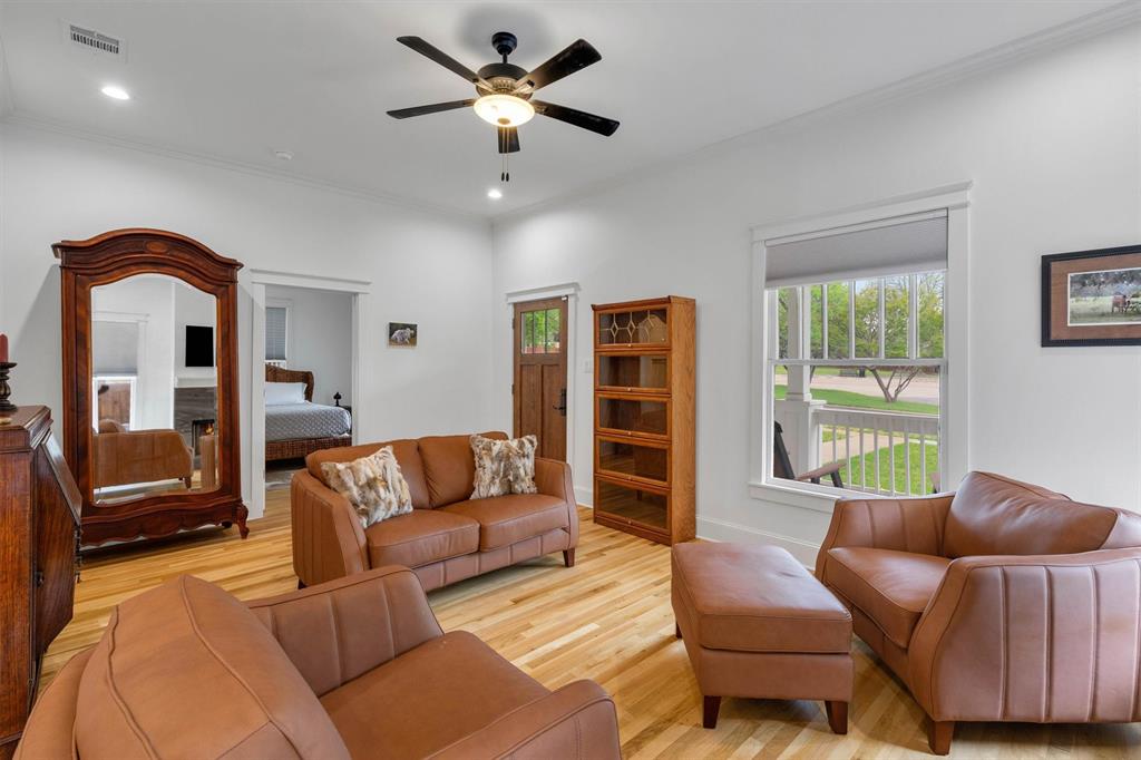 5727 Victor Street Dallas, TX 75214 - Photo 10 of 40 a living room with furniture and a large window
