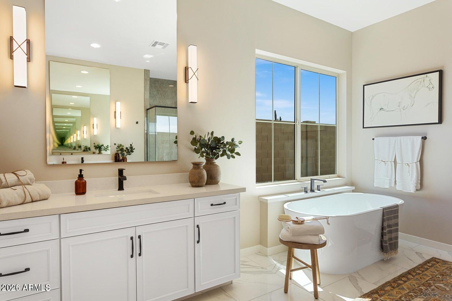 4412 East Roy Rogers Road Cave Creek, AZ 85331 - Photo 24 of 40 a bathroom with a sink and a mirror