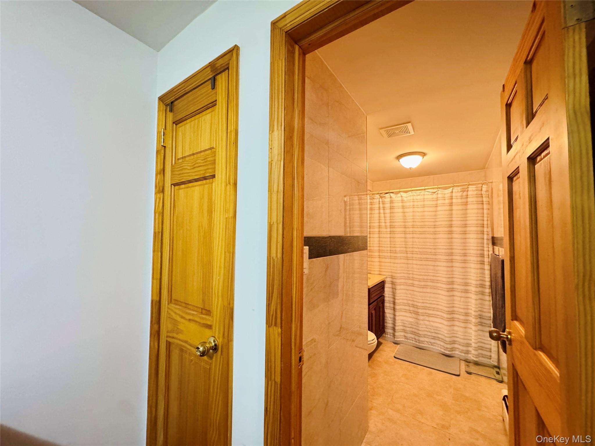 37-49 81st Street, Unit 3A Queens, NY 11372 - Photo 11 of 20 a bathroom with a shower